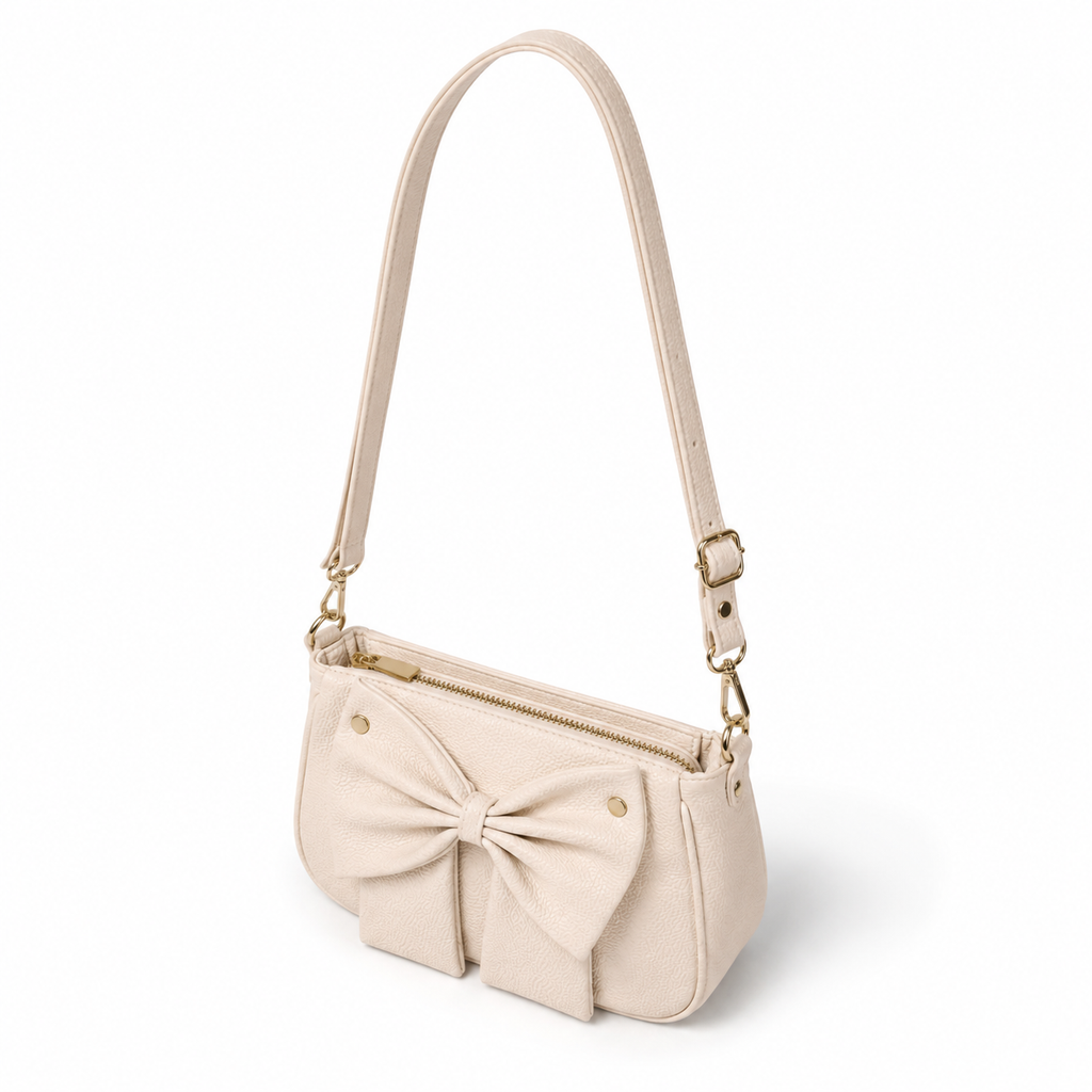 Elegant cream bow shoulder bag for women with adjustable strap and zip closure by Aorelia